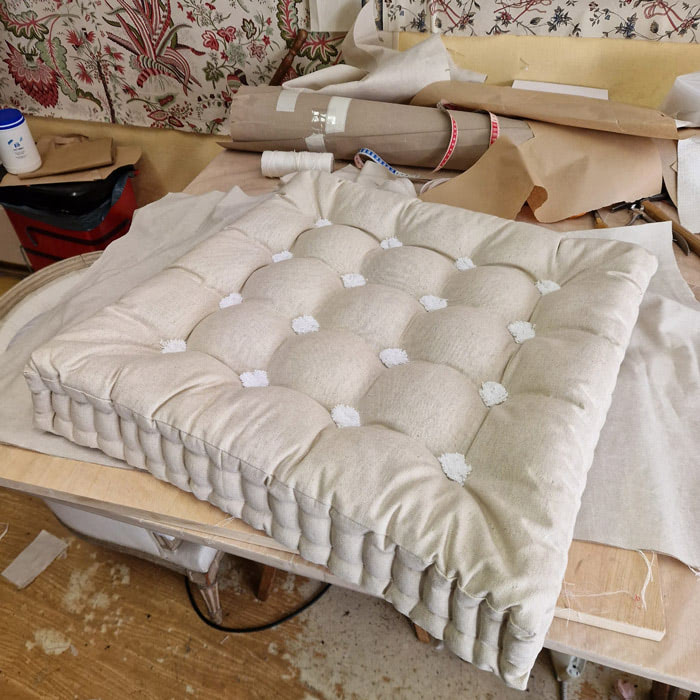 Upholstered cushion Upholstered cushion