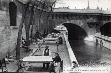 Old postcard: mattress makers on the quays of the Seine in Paris